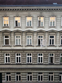 Front of historical viennese house and curtain gone with the wind