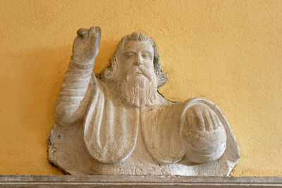 Close-up of statue on wall