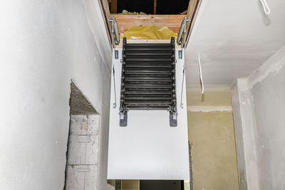 High angle view of ladder by building