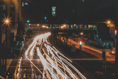 Light trails on city street at night