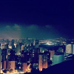 Illuminated cityscape at night