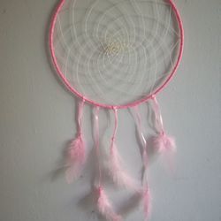 High angle view of pink decoration hanging against wall