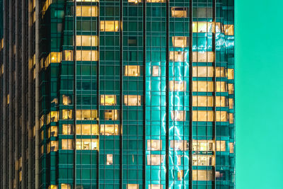 Low angle view of illuminated building at night