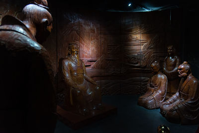 Buddha statue in illuminated temple