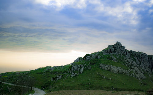 Scenic view of rocky mountains against sky