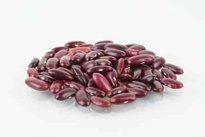 Close-up of candies against white background