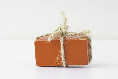 Close-up of rope against white background