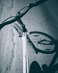 High angle view of bicycle parked on road