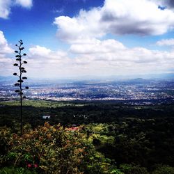 View of city against cloudy sky