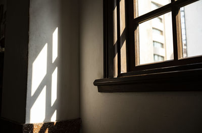 Sunlight streaming through window of house