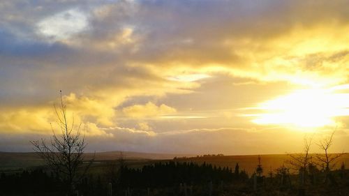 Scenic view of dramatic sky during sunset