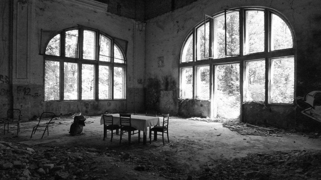 window, seat, chair, day, abandoned, indoors, architecture, table, damaged, run-down, building, old, no people, built structure, obsolete, arch, absence, decline, deterioration, ruined, setting