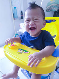 Portrait of cute baby girl at home