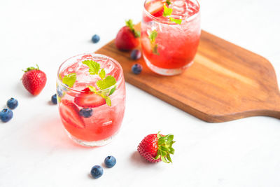 High angle view of fruits in glass on table