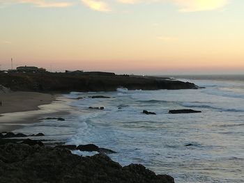 View of calm sea at sunset