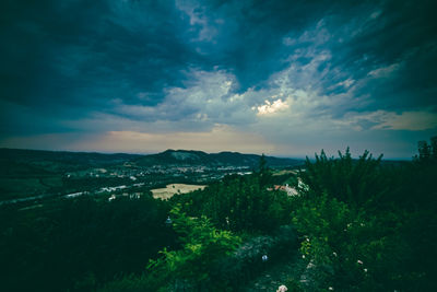 Scenic view of landscape against sky during sunset