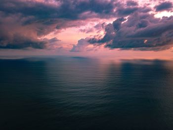 Scenic view of sea against sky at sunset