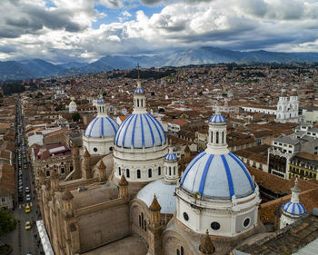 Aerial view of cathedral in city against sky