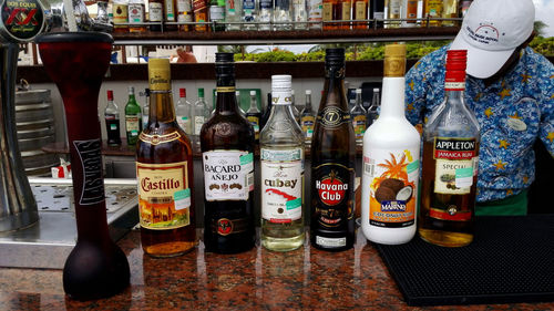 Bottles on display at market stall