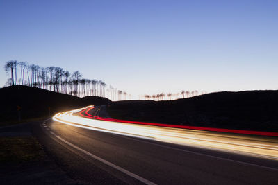 Light trails on road at night