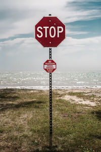 Stop, no trespassing. a information sign on la beach.