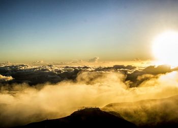 Scenic view of mountains against sky during sunset