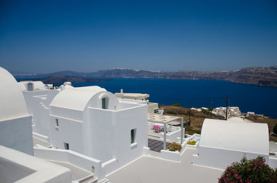 High angle view of buildings against clear sky