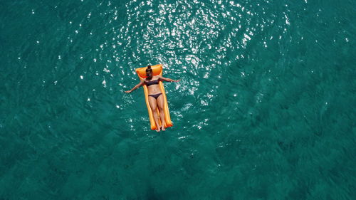 High angle view of a girl in sea