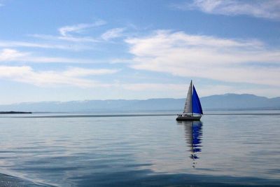 Lone boat in calm blue sea