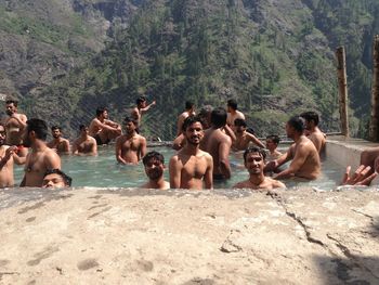 People bathing in swimming pool