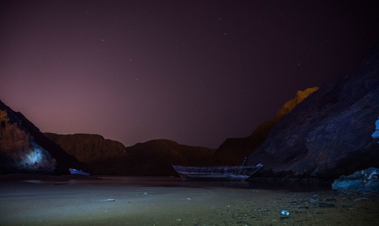 SCENIC VIEW OF MOUNTAIN AT NIGHT