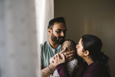 Father and mother with baby