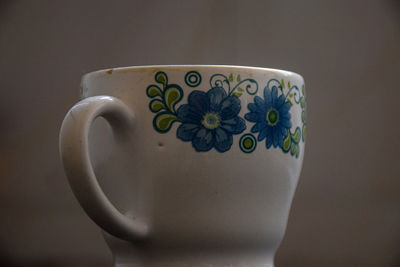 Close-up of coffee cup on table