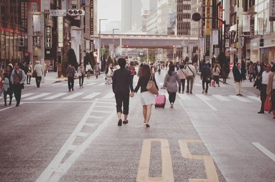 People walking on city street