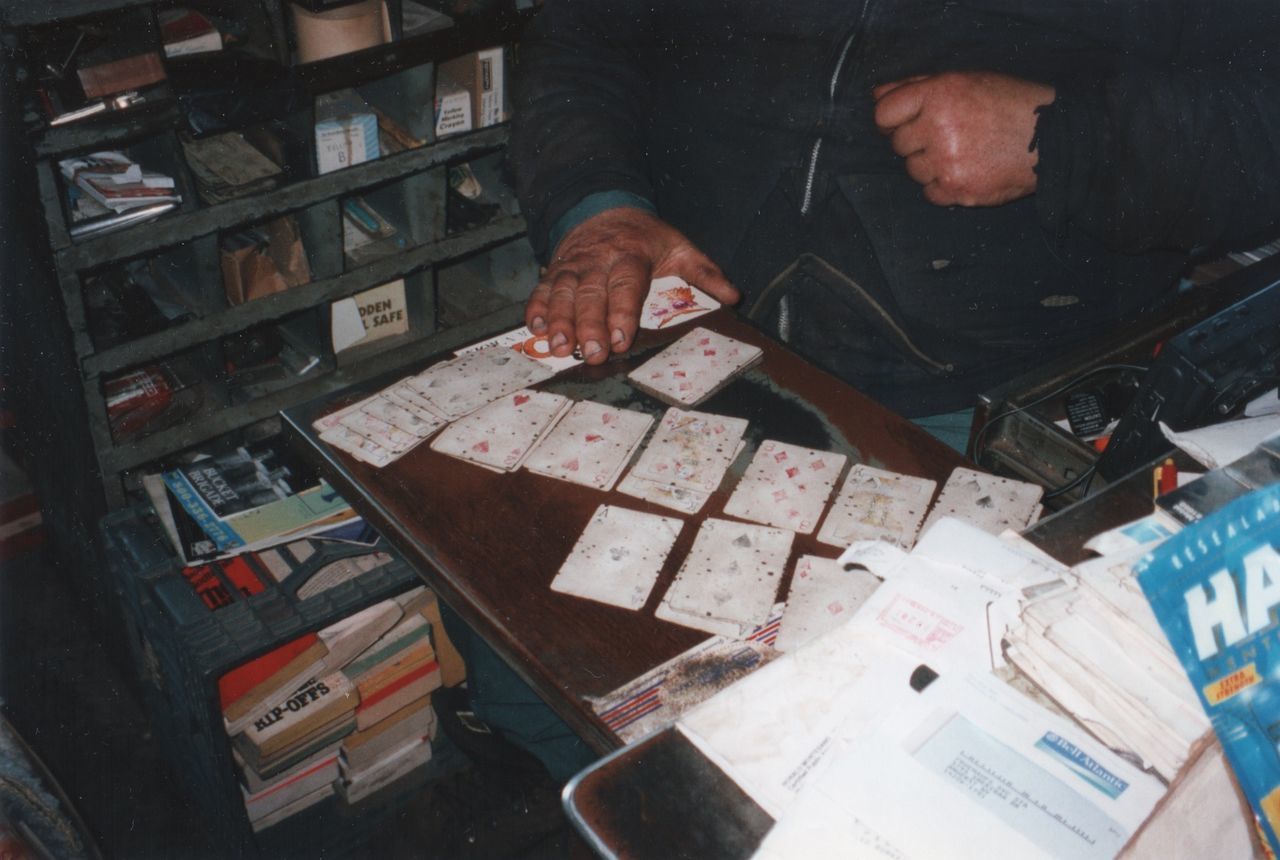 HIGH ANGLE VIEW OF MAN WORKING AT SHOPPING MALL