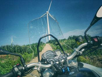 Close-up of bicycle against sky