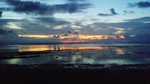 Scenic view of sea at sunset