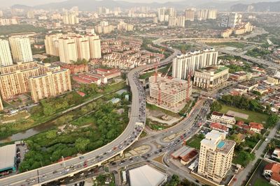 High angle view of street amidst buildings in city