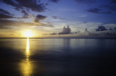 Scenic shot of calm sea at sunset