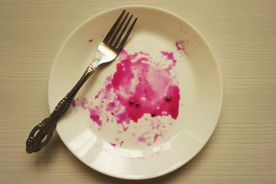 High angle view of cake in plate on table