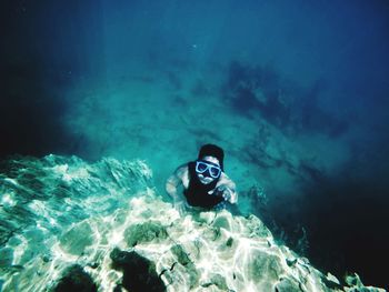 Man swimming in sea