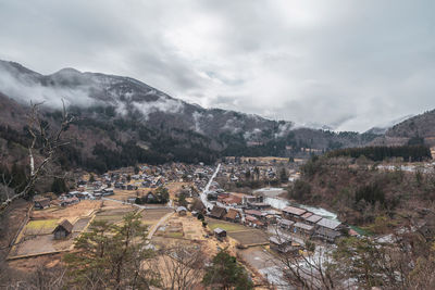 High angle view of buildings against sky