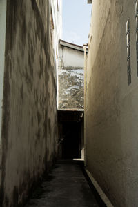 Narrow alley along buildings