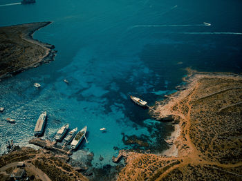 High angle view of boats moored on sea