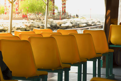 Empty chairs and tables in cafe