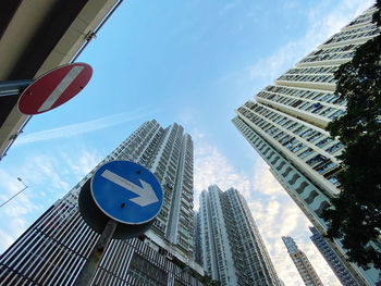 Low angle view of modern buildings against sky