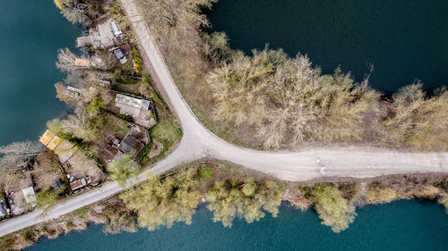 High angle view of road amidst trees