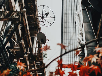 Close-up of bicycle parked by metal structure