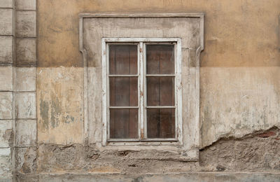 Closed window of old building