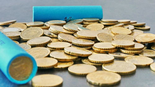 High angle view of coins on table